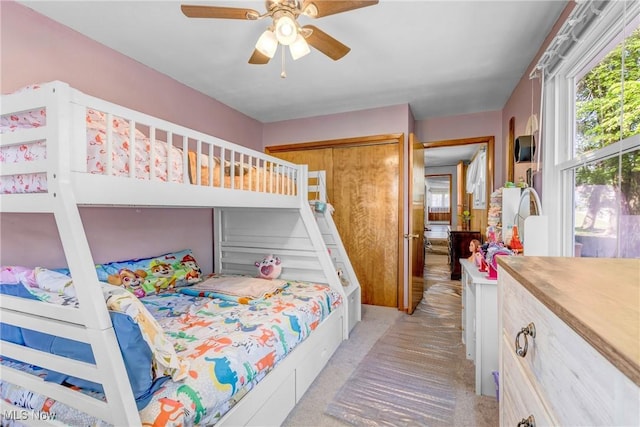 24512 Emery Rd, Warrensville Heights, OH 44128 - bedroom featuring light carpet and ceiling fan