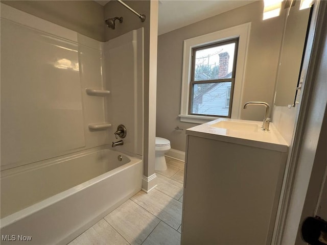 full bathroom with shower / washtub combination, vanity, and toilet