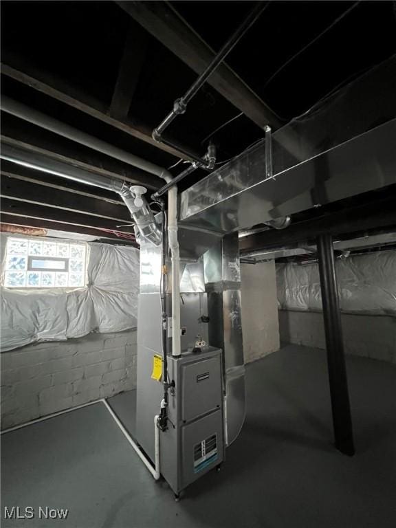 basement with heating unit