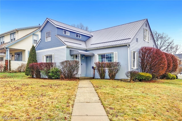 view of front of house with a front lawn