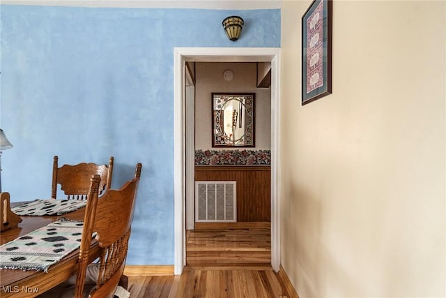 dining space featuring hardwood / wood-style flooring