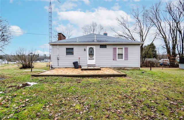 back of property featuring a yard and a patio area