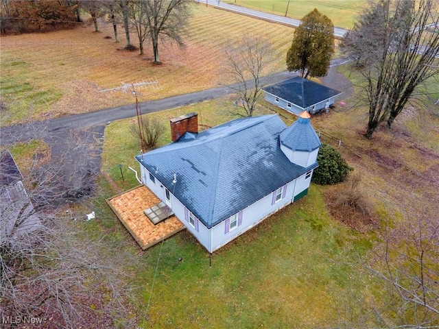 birds eye view of property featuring a rural view