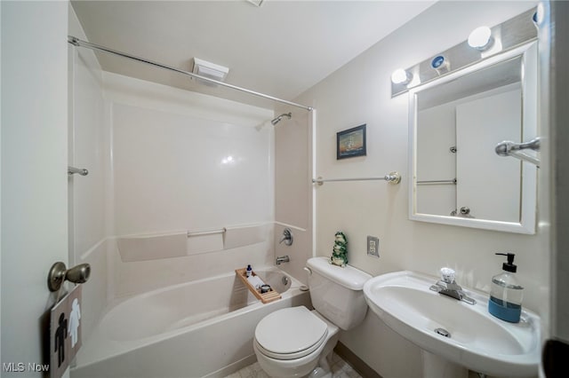 full bathroom with sink, bathtub / shower combination, and toilet