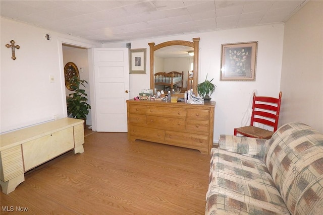 living area featuring hardwood / wood-style floors