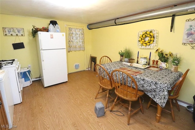 dining room featuring light hardwood / wood-style floors