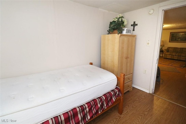 bedroom featuring hardwood / wood-style floors