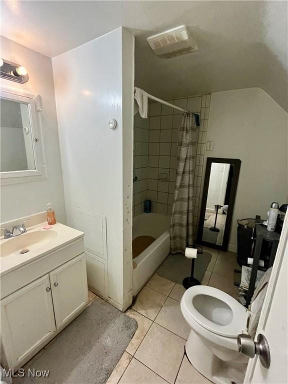 full bathroom with vanity, tile patterned floors, shower / bath combination with curtain, and toilet