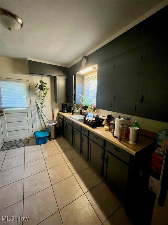 bathroom with tile patterned flooring