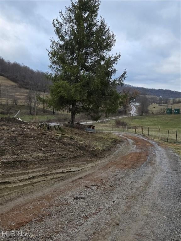 view of street featuring a rural view