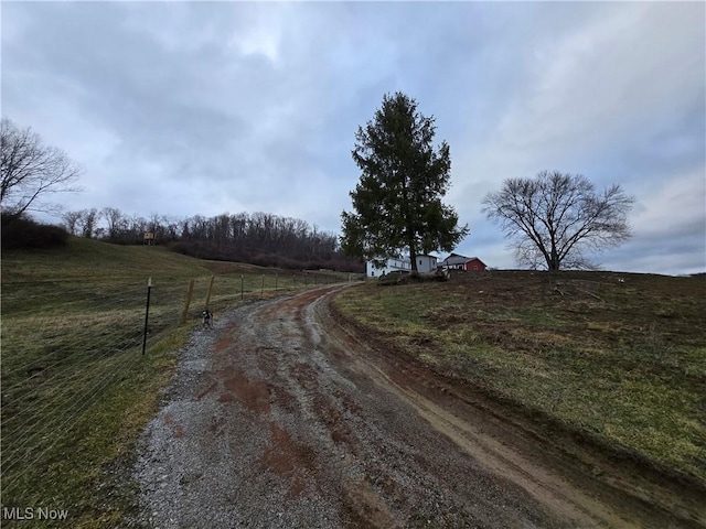 view of road featuring a rural view