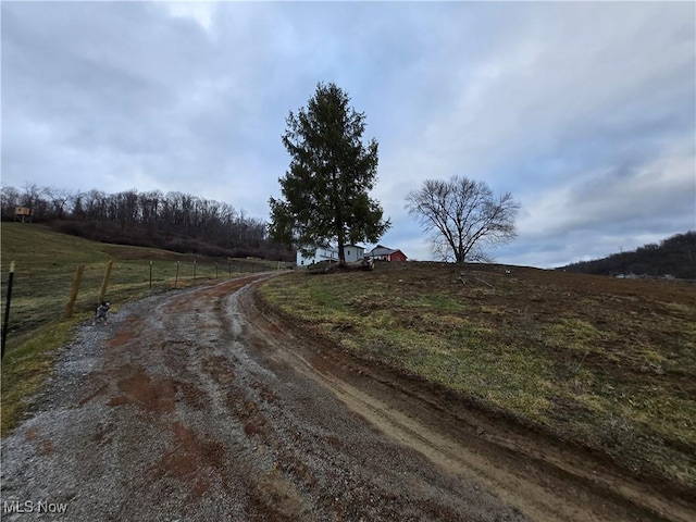 view of road featuring a rural view