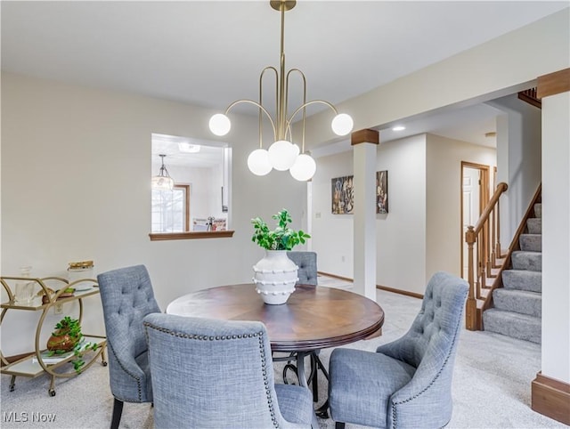 dining area with light carpet