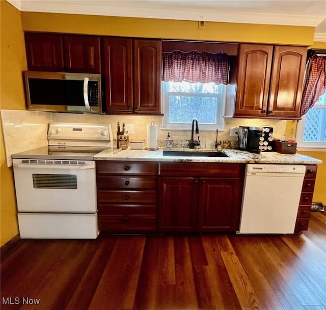 kitchen featuring sink, crown molding, white appliances, dark wood-type flooring, and backsplash