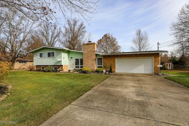 split level home featuring a garage and a front lawn