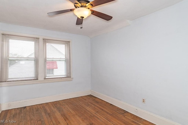 unfurnished room featuring ceiling fan and wood-type flooring