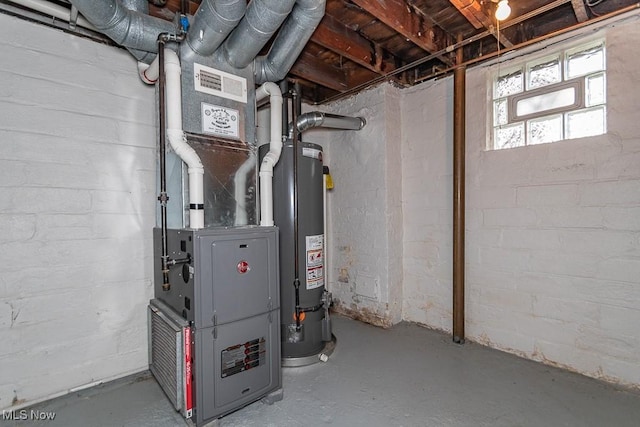 utility room with gas water heater