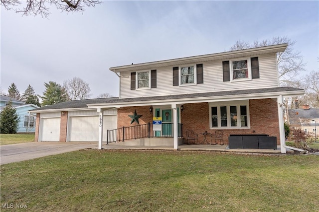 front facade with a porch, a garage, and a front lawn