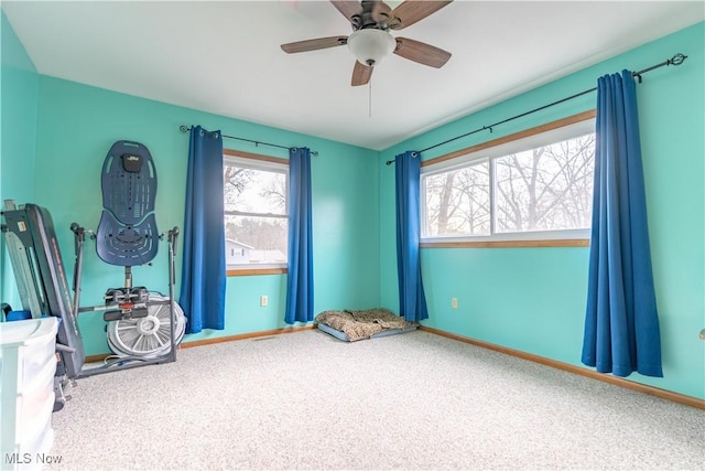 miscellaneous room with ceiling fan and carpet flooring