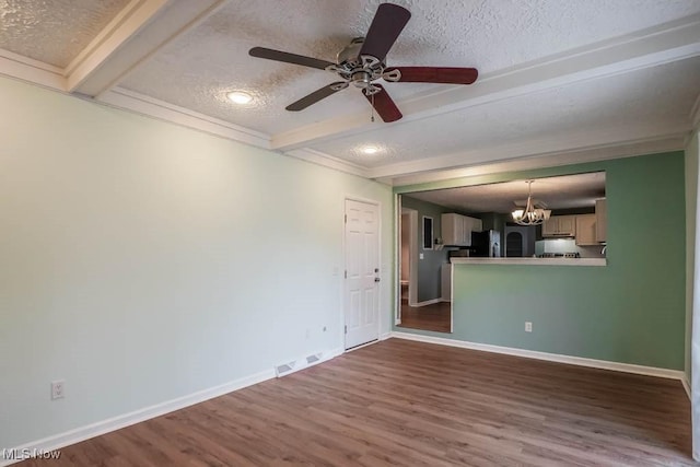 unfurnished living room featuring beam ceiling, dark wood-type flooring, a textured ceiling, and ceiling fan with notable chandelier