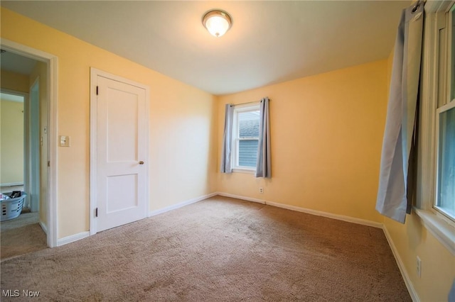 view of carpeted spare room