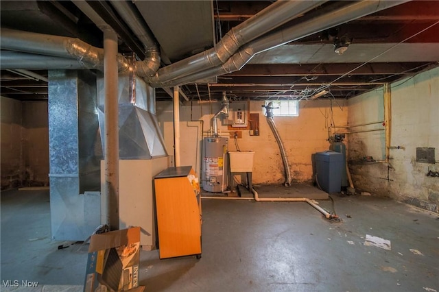 basement featuring water heater and heating unit