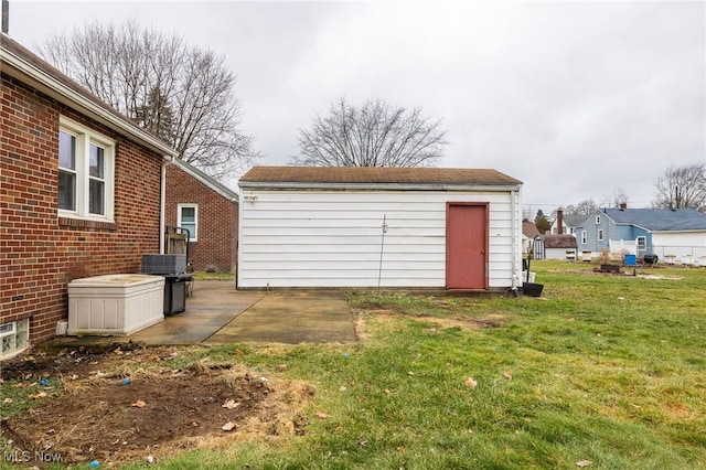 garage with a yard