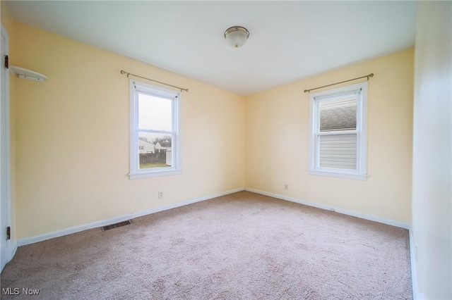 view of carpeted spare room