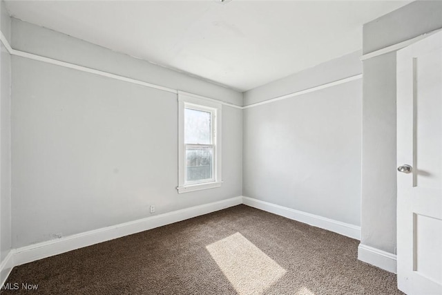 unfurnished room with carpet floors