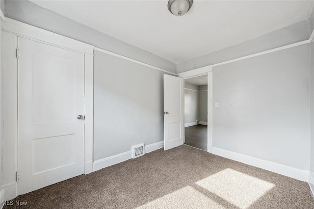 unfurnished bedroom with carpet