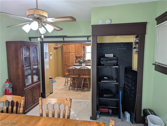 dining space featuring ceiling fan