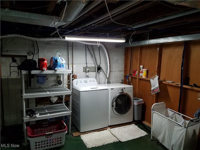 washroom with separate washer and dryer