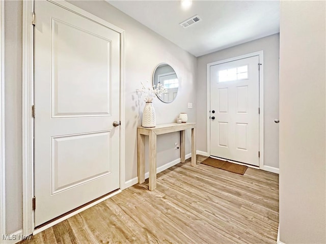 foyer entrance featuring light hardwood / wood-style flooring