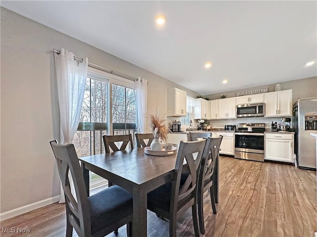 dining room featuring light hardwood / wood-style flooring