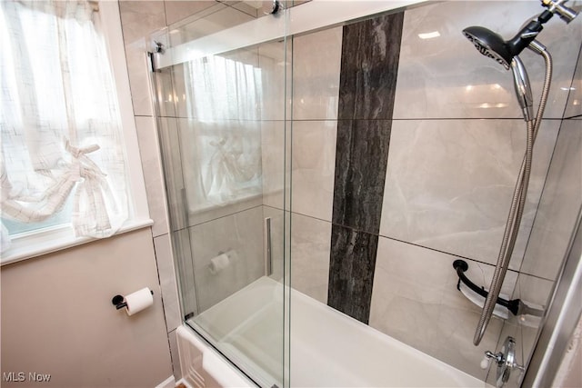 bathroom featuring enclosed tub / shower combo