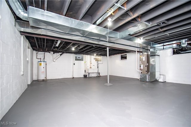 basement with heating unit and water heater