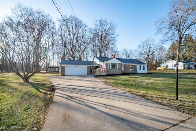 ranch-style home with a garage and a front yard