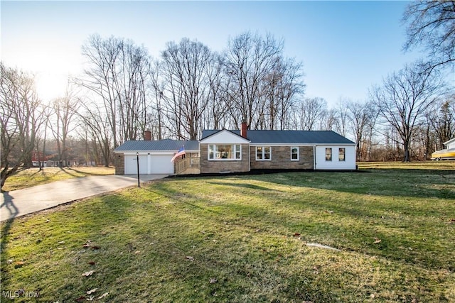 ranch-style house with a garage and a front lawn