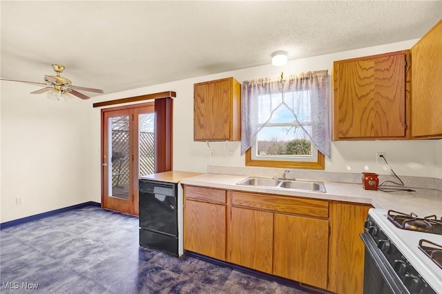 kitchen featuring sink, dishwasher, ceiling fan, a textured ceiling, and gas range