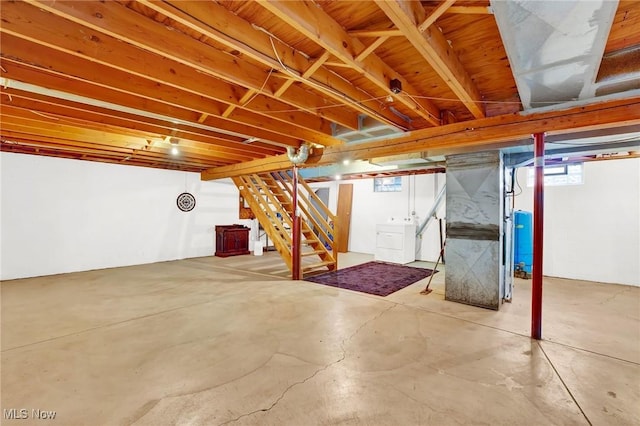 basement with separate washer and dryer