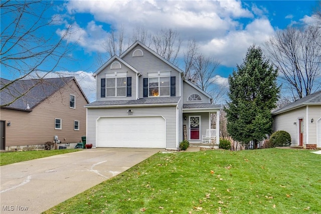 front of property featuring a garage and a front yard