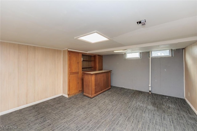 interior space with dark carpet and indoor bar