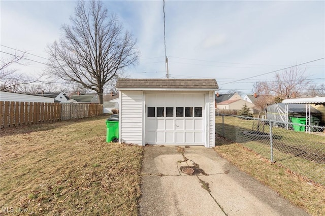 garage with a yard