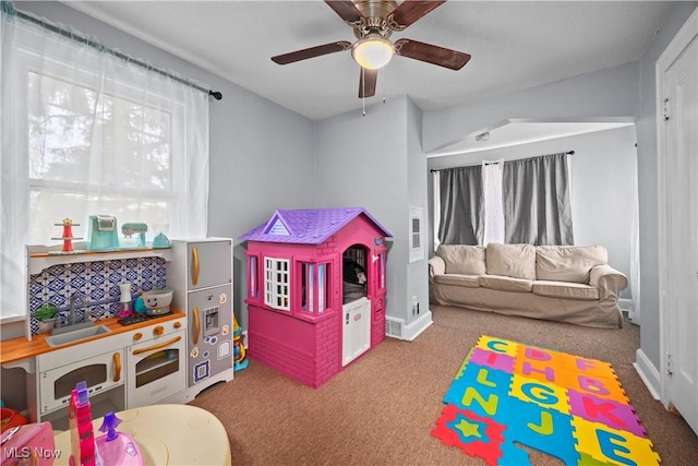 game room featuring carpet floors and ceiling fan