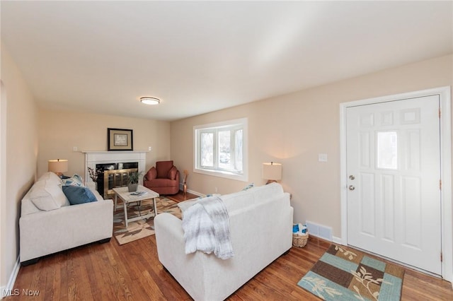 living room with hardwood / wood-style floors