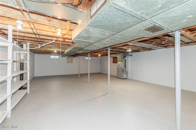 basement featuring heating unit