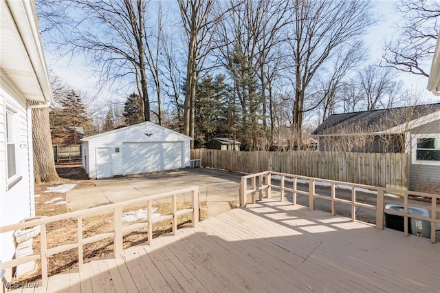 wooden terrace featuring an outbuilding, a garage, and central air condition unit