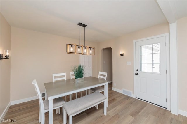 dining room featuring light hardwood / wood-style floors