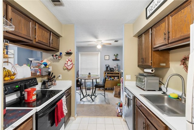 kitchen with sink, black electric range, a textured ceiling, stainless steel dishwasher, and ceiling fan