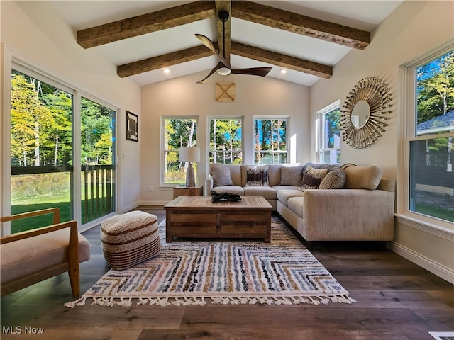 sunroom / solarium featuring vaulted ceiling with beams and ceiling fan